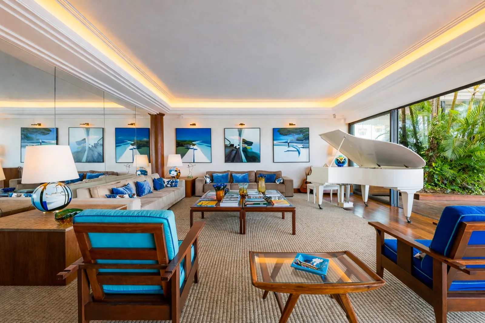 Living room seating and artwork, the piano beyond