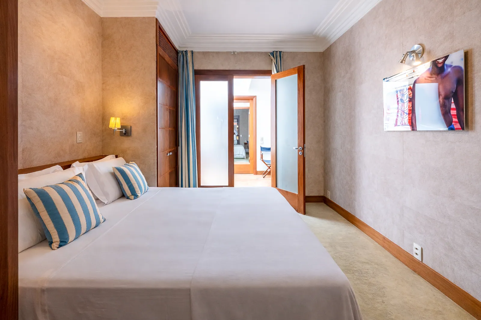 Twin beds pushed together, soft carpet underfoot