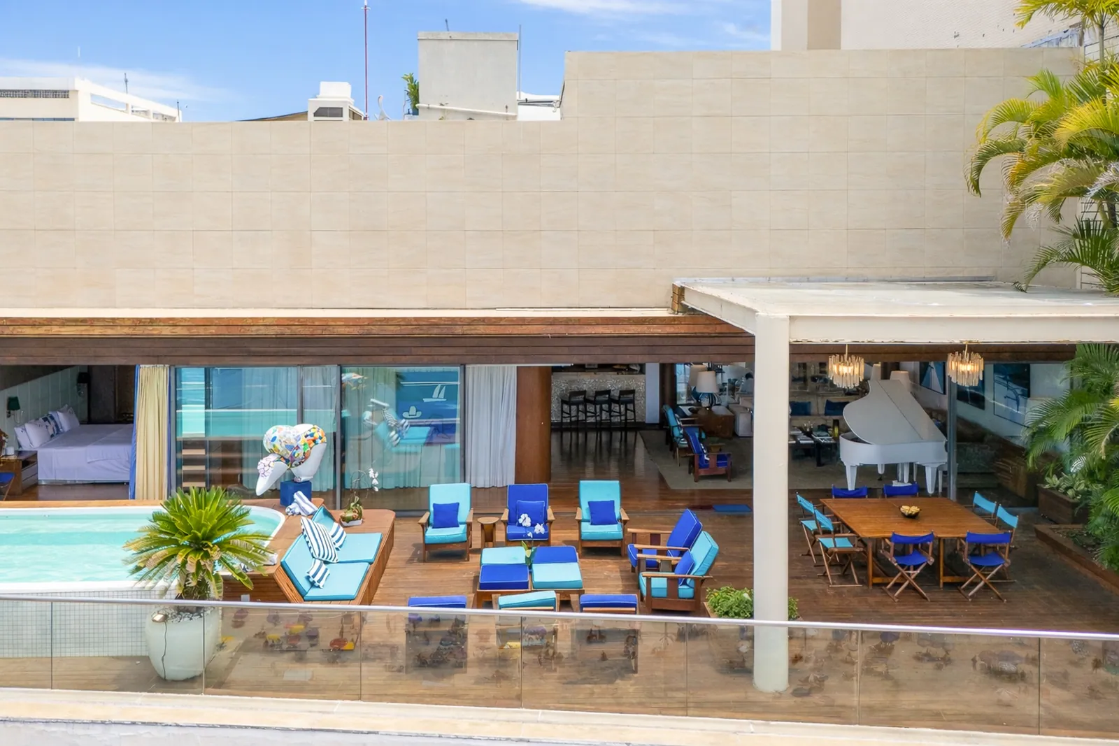 The terrace and pool seen from the far end of the deck